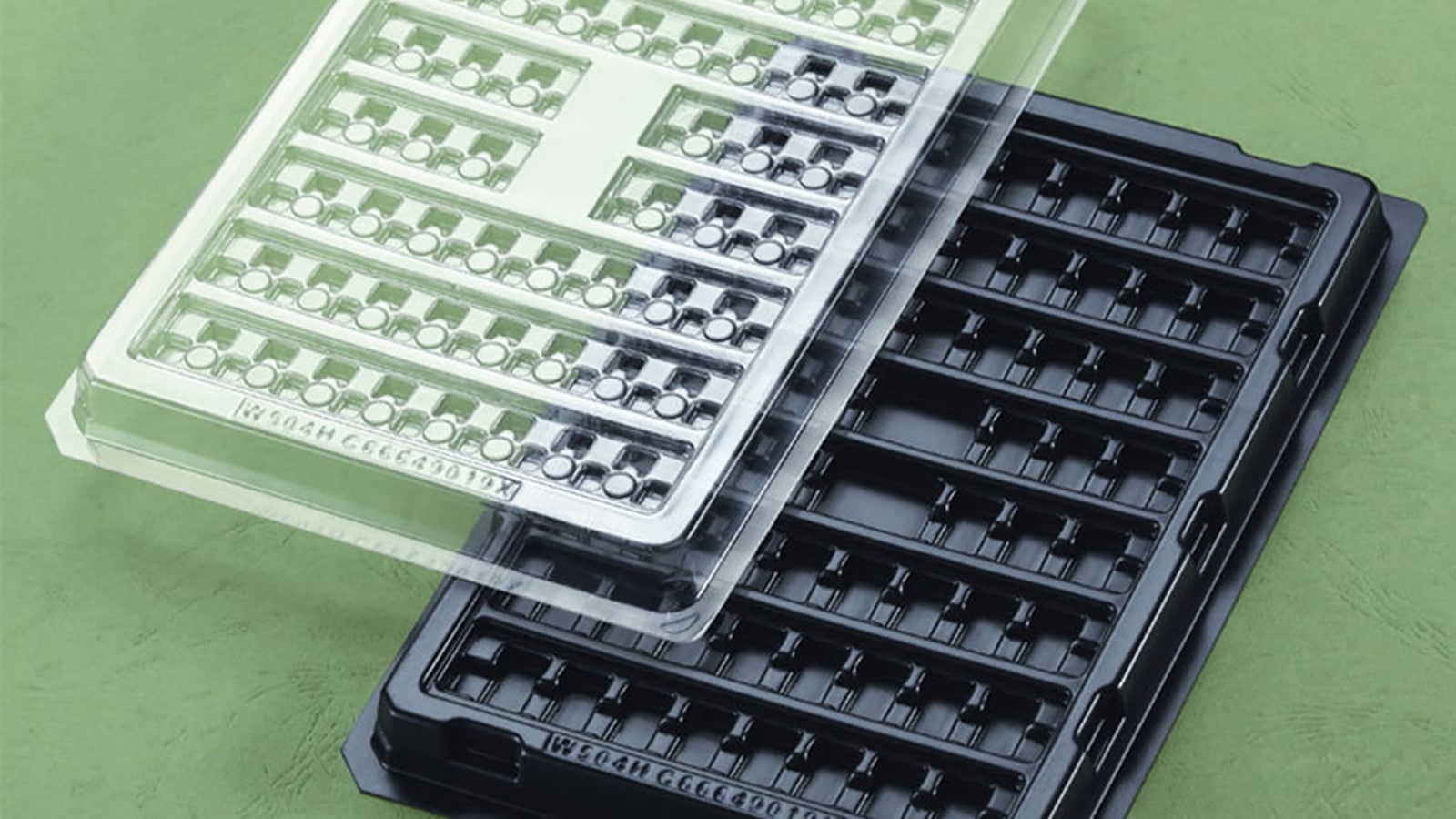Plastic electronic component trays