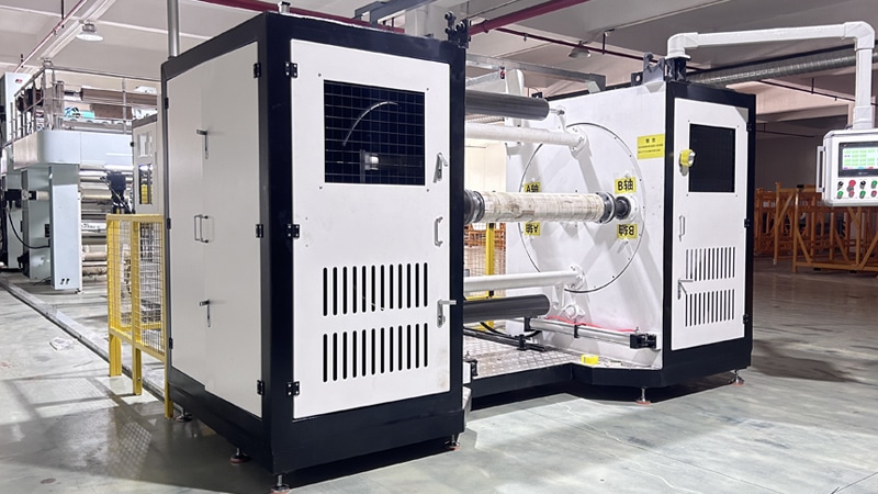 Shaftless fully automatic rewinder
